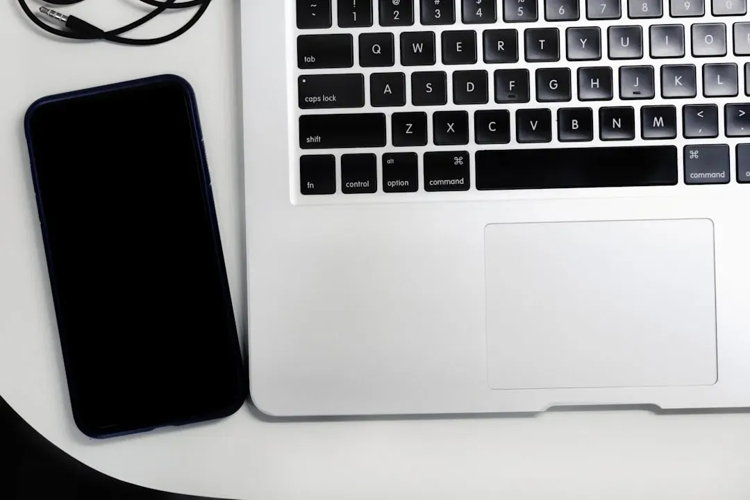 Modern finance workflow with laptop and smartphone